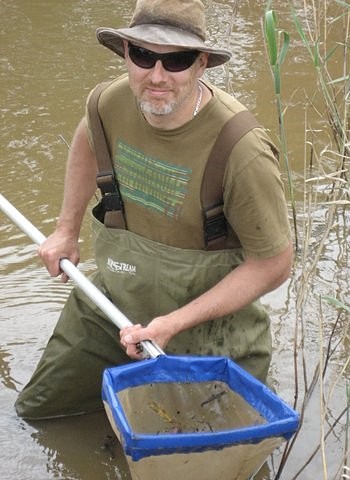 Dr Shane Brooks aquatic ecologist sampling the Wimmera River, Victoria, Australia